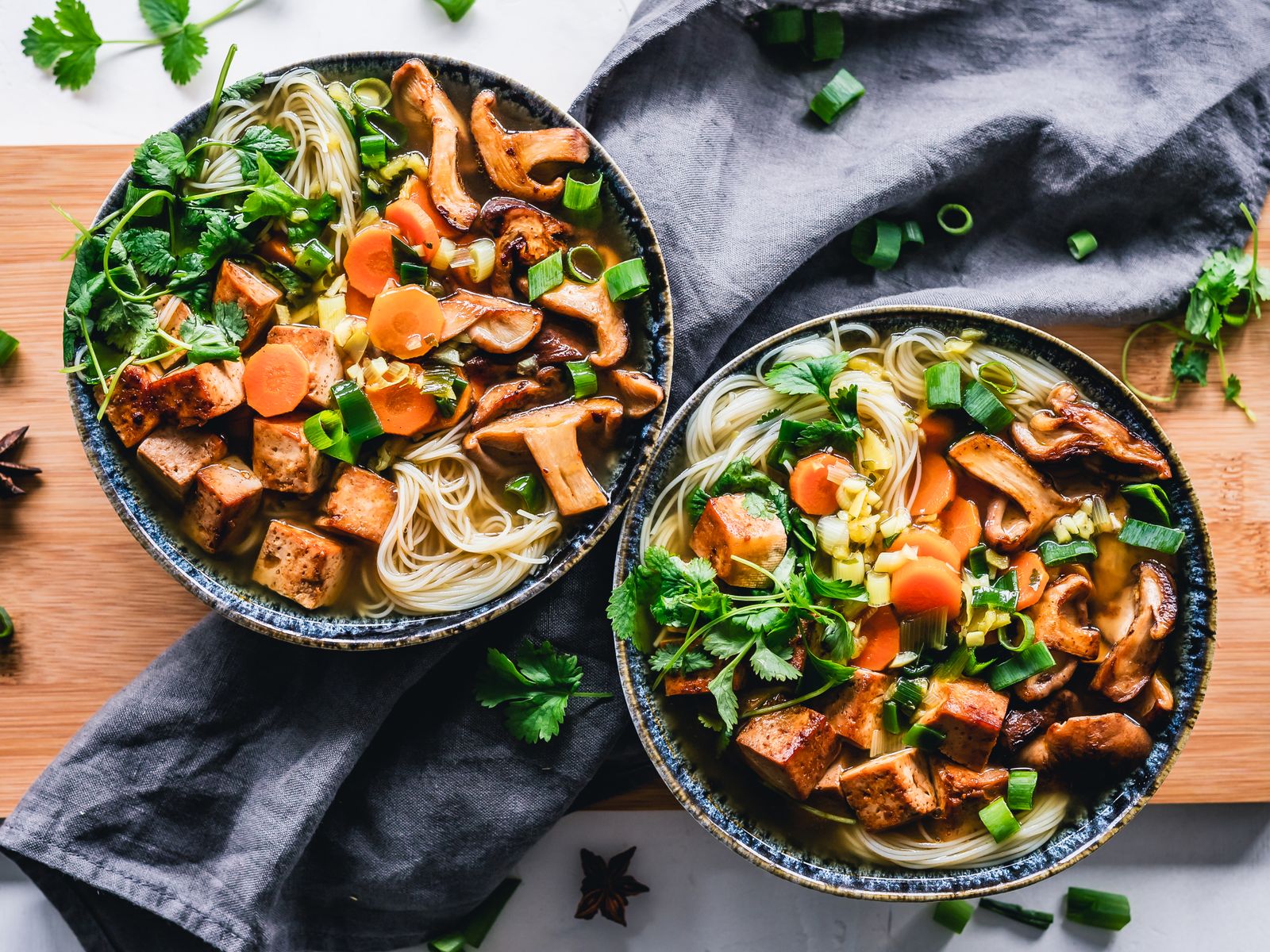 Bowls of hearty stew with vegetables